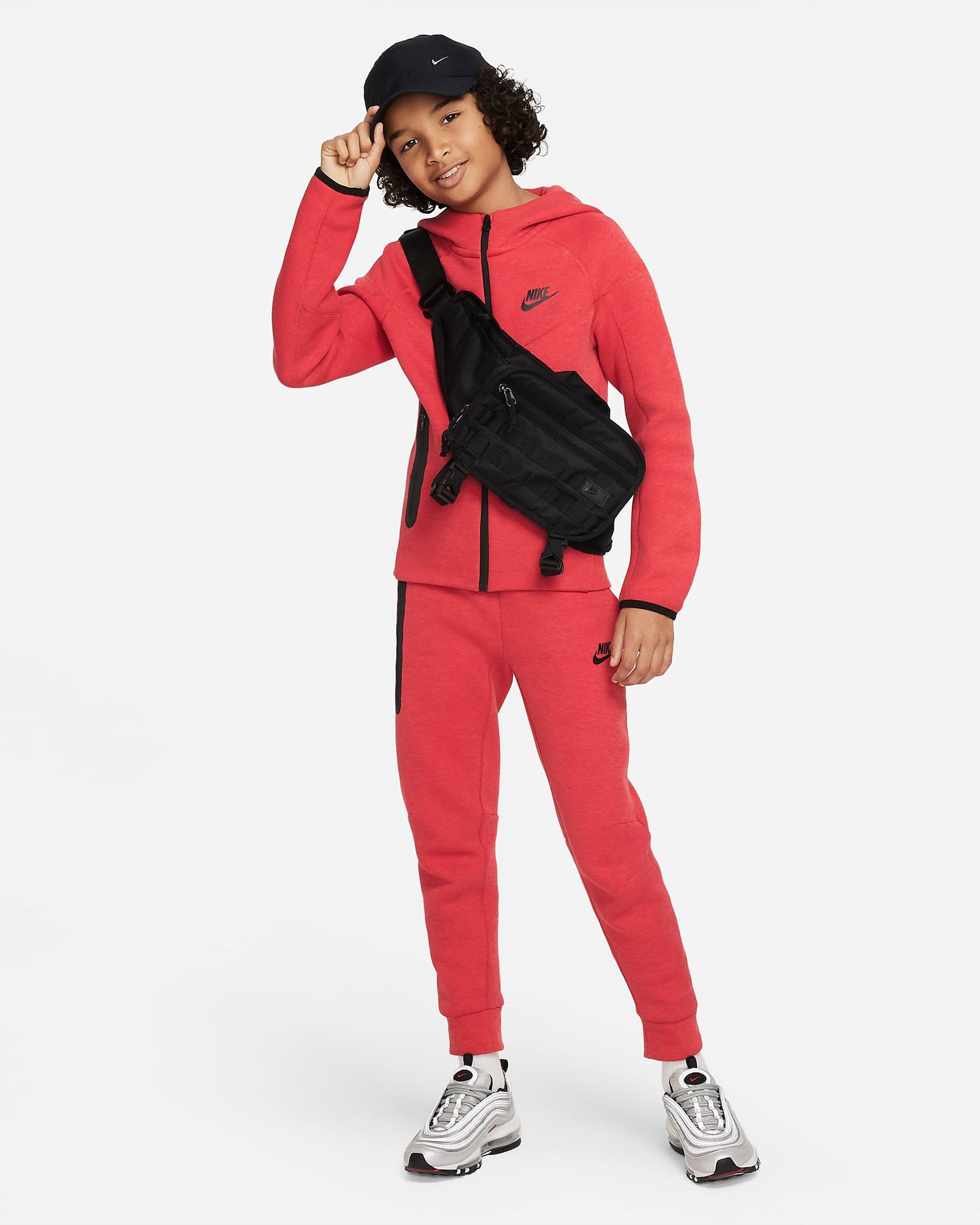 Nike Sportswear Tech Fleece Older Boys' Trousers | Light University Red Heather