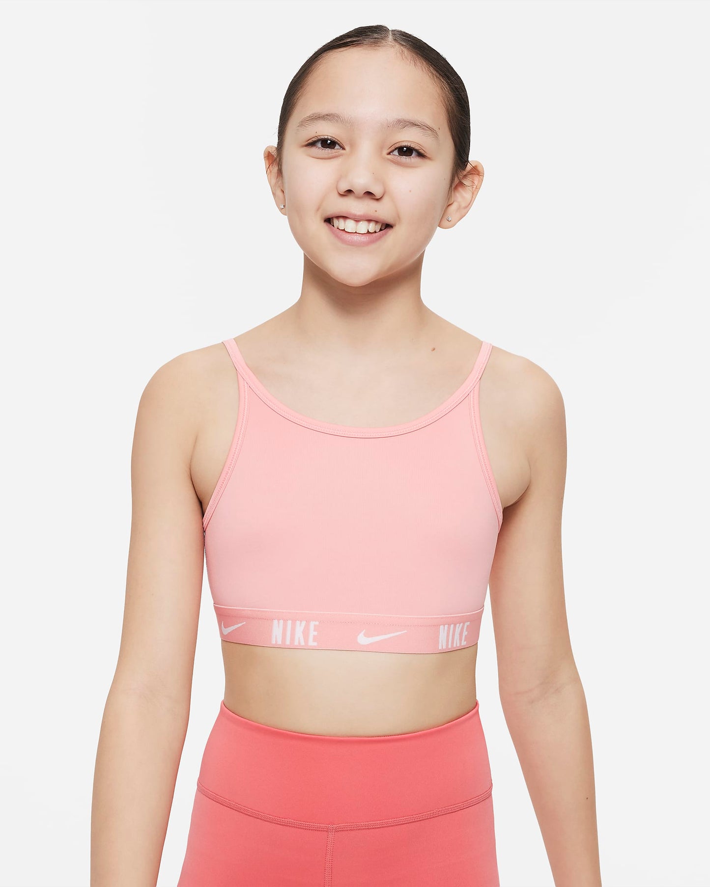 Nike Trophy Older Girls' Sports Bra | Coral Chalk