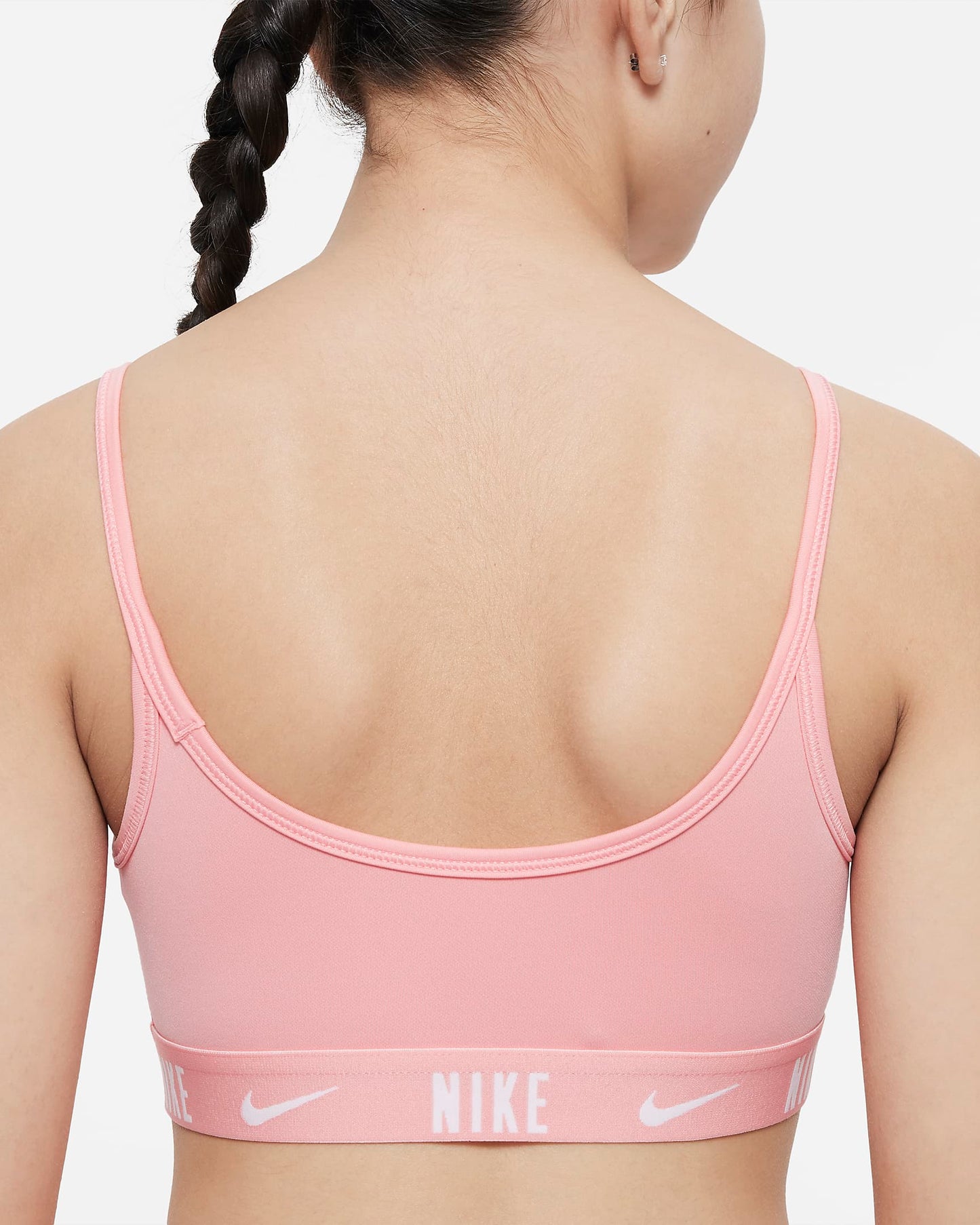 Nike Trophy Older Girls' Sports Bra | Coral Chalk